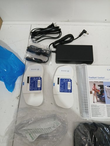 CAIRE FreeStyle Comfort Portable Oxygen Concentrator with 8 and 16 hour cell batteries, carry bag - white (model:as200-203) image 8