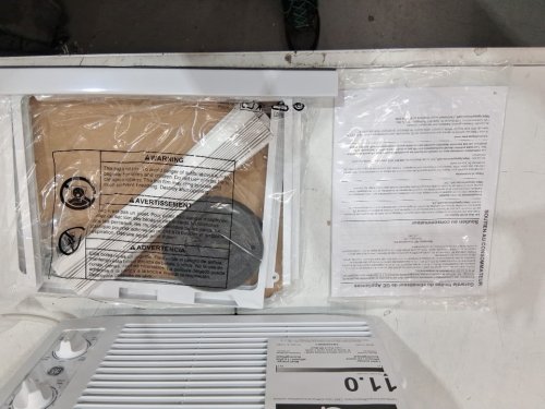 GE APPLIANCES ELECTRONIC WINDOW AIR CONDITIONER - 5,000 BTU - 150SQ.FT - WHITE (MODEL: AWAS05BWFC) image 4