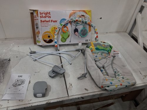bright starts vibrating bouncer with 3-point harness and removable toy bar - 20lb max - safari fun (model: 12204) image 2