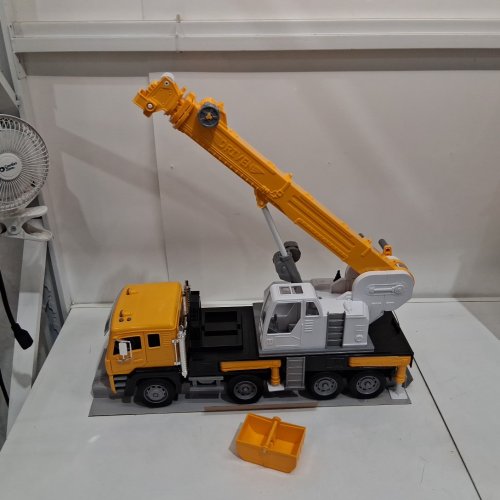 Driven by Battat jumbo crane truck toy with movable crane arm, sounds, lights, crane bucket attachment & miniature construction worker - 27" - yellow/black/white (model: WH1362z) image 3