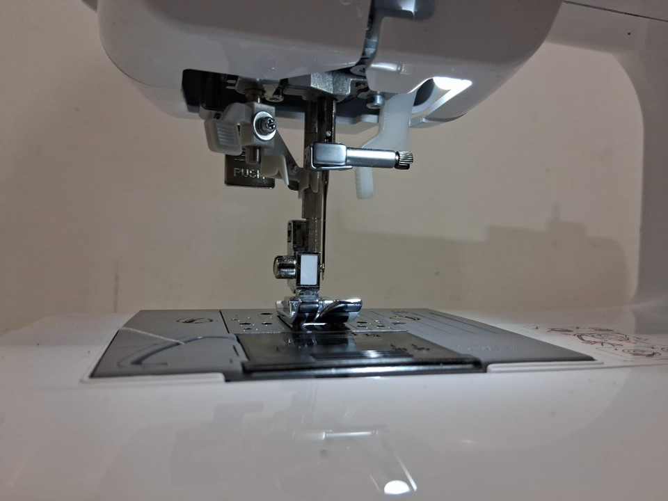 Brother Sewing and Quilting Machine with 37 Built-In Stitches, Wide Quilting Table, Automatic Needle Threader, Drop-In Top Bobbin, 1-Step Buttonhole, 8 Included Presser Feet and Bright LED Work Area - White (Model: XR3774) image 5