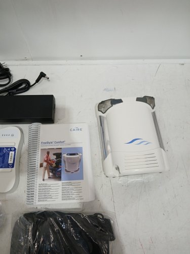 CAIRE FreeStyle Comfort Portable Oxygen Concentrator with 8 and 16 hour cell batteries, carry bag - white (model:as200-203) image 9