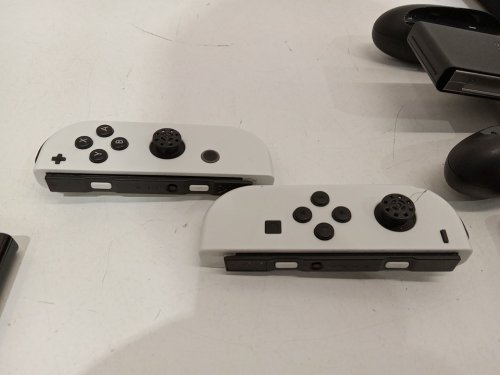 Nintendo Switch (OLED Model) with White Joy-Con Controllers - White (model: heg-001) image 4