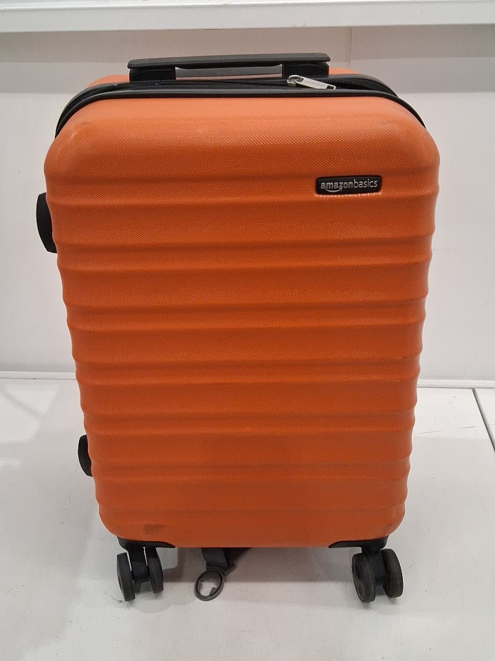 Amazon Basics Hardshell Carry-On Luggage With Wheels - 21" x 13" x 8" - orange image 3