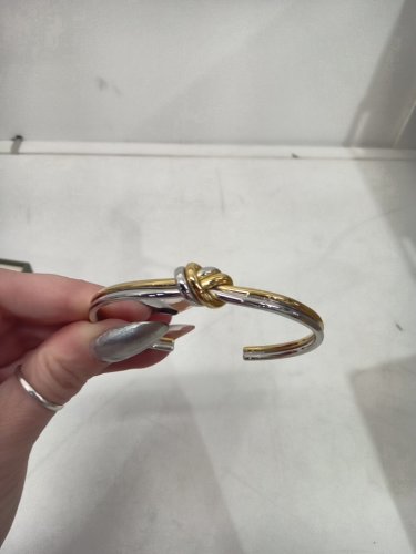 women's waldor & co. dual knot bangle - water resistant and tarnish-free - 25mm x 25mm - 316l stainless steel silver and 14k gold polish. image 3