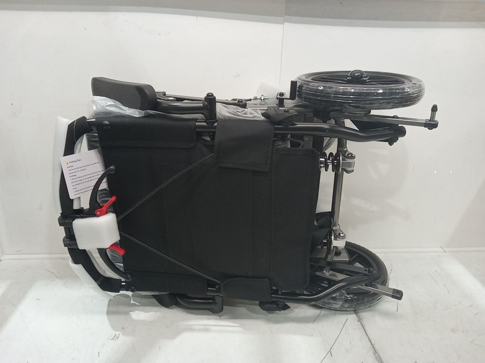 LIGHTWEIGHT PORTABLE FOLDABLE TRANSPORT WHEELCHAIR WITH LOCKING HANDBRAKE AND FLIP ARMRESTS - 220 LBS CAP - GREY image 6