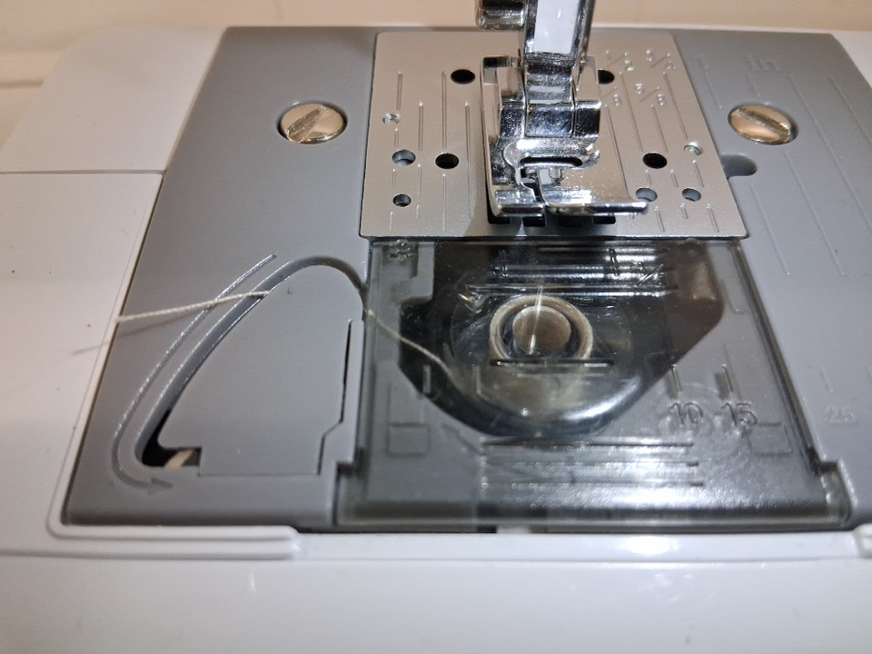 Brother Sewing and Quilting Machine with 37 Built-In Stitches, Wide Quilting Table, Automatic Needle Threader, Drop-In Top Bobbin, 1-Step Buttonhole, 8 Included Presser Feet and Bright LED Work Area - White (Model: XR3774) image 6