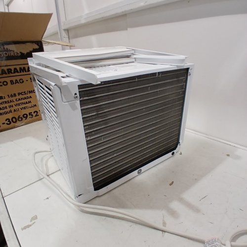GE APPLIANCES ELECTRONIC WINDOW AIR CONDITIONER - 5,000 BTU - 150SQ.FT - WHITE (MODEL: AWAS05BWFC) image 9
