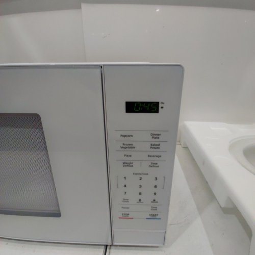 MAGIC CHEF COUNTERTOP MICROWAVE - 1.1 CU.FT - 700W - WHITE (MODEL: MC110MWF) image 8