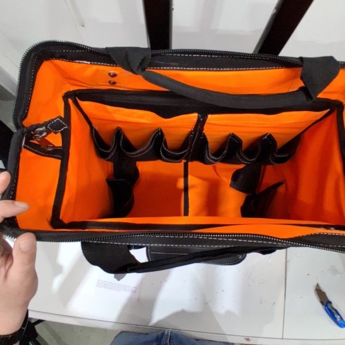 HEAVY DUTY ROLLER TOOL BAG WITH ADJUSTABLE TELESCOPING HANDLE & STABLE BASE - 110LBS CAP - 25 POCKETS - BLACK/ORANGE (MODEL: 18YC600U) image 4