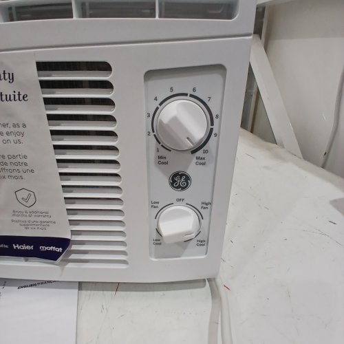 GE APPLIANCES ELECTRONIC WINDOW AIR CONDITIONER - 5,000 BTU - 150SQ.FT - WHITE (MODEL: AWAS05BWFC) image 2