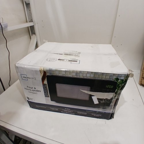 MAINSTAYS COMPACT COUNTERTOP MICROWAVE OVEN - 0.7 CU FT - 700W - BLACK (MODEL: MSCMVB07BK-L2) image 6