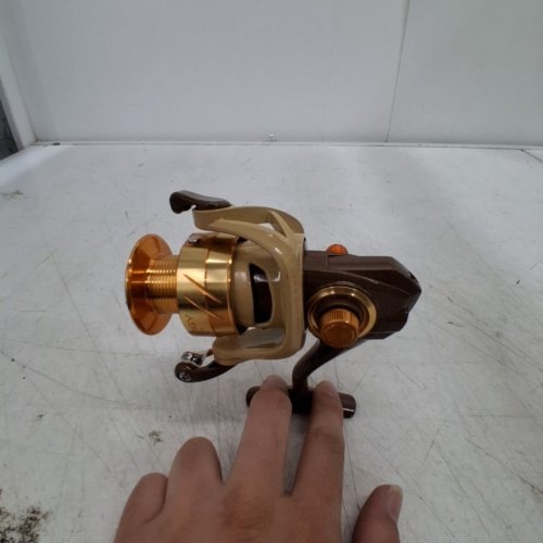 BPS PRODIGY SPINNING REEL -5.0:1 GEAR RATIO - RIGHT-HAND RETRIEVE - BLUE / BROWN / ORANGE image 3