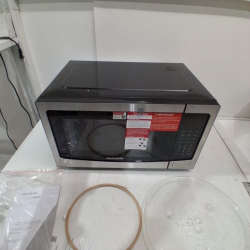 FRIGIDAIRE COMPACT COUNTERTOP MICROWAVE OVEN - 1.1 CU.FT. - BLACK/SILVER (MODEL: EMW1134) image 4