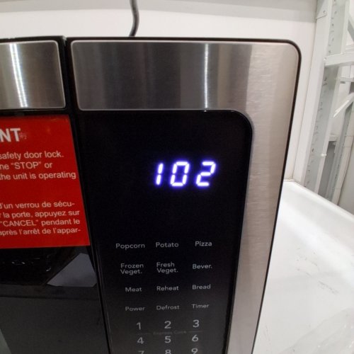 FRIGIDAIRE COMPACT COUNTERTOP MICROWAVE OVEN - 1.1 CU.FT. - BLACK/SILVER (MODEL: EMW1134) image 2