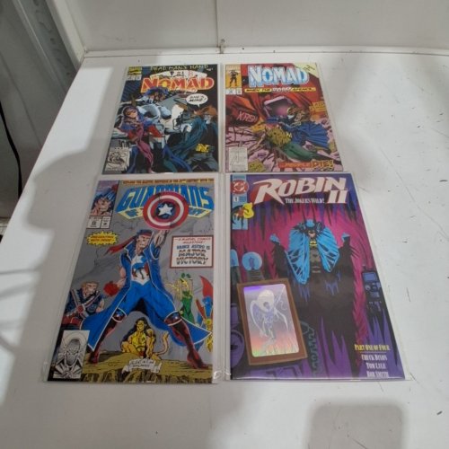 4 ASSTD MARVEL AND DC COMIC BOOKS - ROBIN II THE JOKER'S WILD #1, GUARDIANS OF THE GALAXY #20, NOMAD #5, #12 - VARIOUS AUTHORS image 2