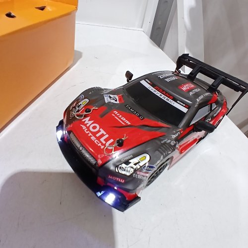 DEERC RC DRIFT CAR 4WD 2.4GHZ REMOTE CONTROL CAR FOR KIDS W/LED LIGHTS WITH 2 SHELLS - MULTICOLOR image 2