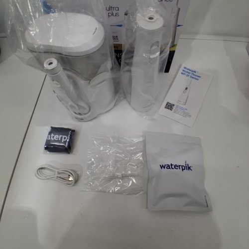 WATERPIK ULTRA PLUS & CORDLESS ENHANCE WATER FLOSSER COMBO PACK - WHITE (MODEL: 2702338) image 4