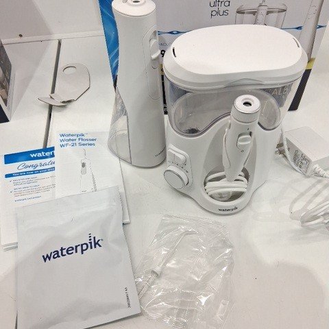WATERPIK ULTRA PLUS & CORDLESS ENHANCE WATER FLOSSER COMBO PACK - WHITE (MODEL: 2702338) image 2