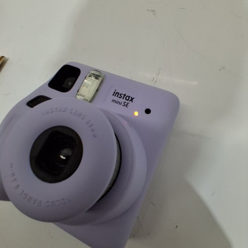 FUJIFILM INSTAX MINI SE INSTANT CAMERA BUNDLE WITH MAGNETIC FRAME, MINI ALBUM, AND 10 EXPOSURE MINI FILM PACK - LAVENDER image 2
