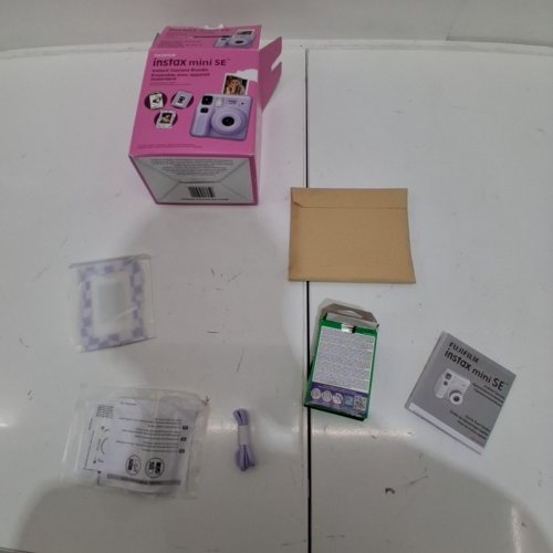FUJIFILM INSTAX MINI SE INSTANT CAMERA BUNDLE WITH MAGNETIC FRAME, MINI ALBUM, AND 10 EXPOSURE MINI FILM PACK - LAVENDER image 4