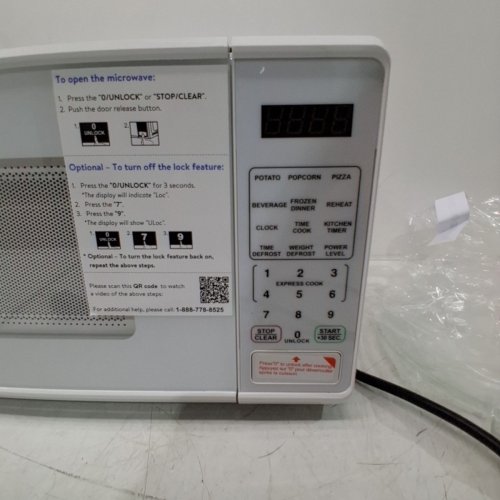 MAINSTAYS COMPACT COUNTERTOP MICROWAVE OVEN - 0.7 CU FT - 700W - WHITE (MODEL: MSCMVB07WE -L2) image 5
