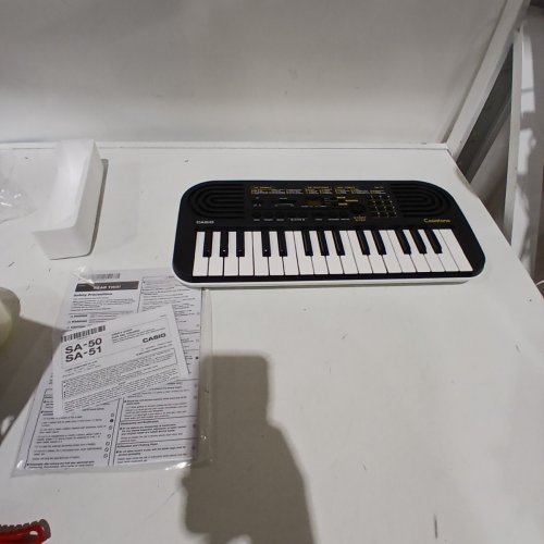 CASIO CASIOTONE 32-KEY MINI KEYBOARD FOR KIDS - 17.6" X 8.2" X 2" - BLACK/WHITE (MODEL: SA-51) image 2