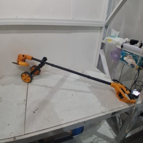 **TOOL ONLY** CORDLESS WHEELED CIRCULAR BLADE LAWN TRIMMER - ORANGE AND BLACK image 2