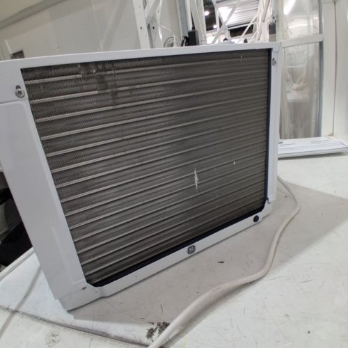 GE APPLIANCES ELECTRONIC WINDOW AIR CONDITIONER - 5,000 BTU - 150SQ.FT - WHITE (MODEL: AWAS05BWFC) image 4