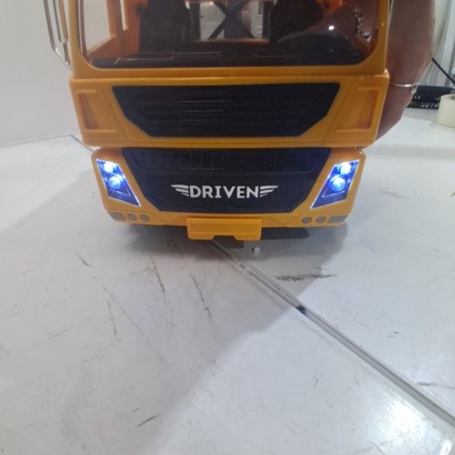 DRIVEN BY BATTAT JUMBO CRANE TRUCK TOY WITH MOVABLE CRANE ARM, SOUNDS, LIGHTS, CRANE BUCKET ATTACHMENT & MINIATURE CONSTRUCTION WORKER - 27" - YELLOW/BLACK/WHITE (MODEL: WH1362Z) image 2