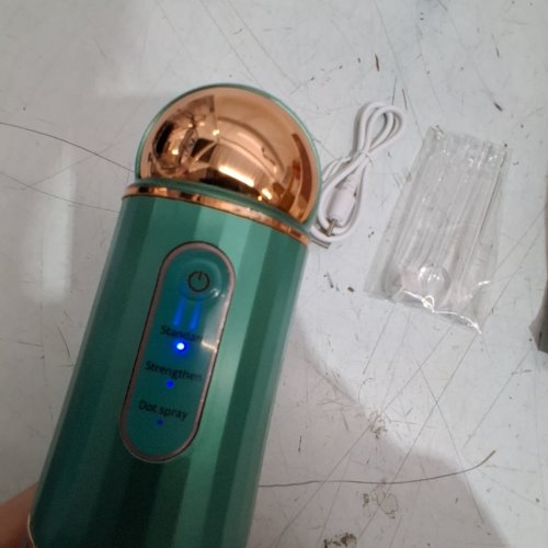 PORTABLE ELECTRIC ORAL IRRIGATOR WITH ATTACHMENTS - GREEN/GOLD image 2