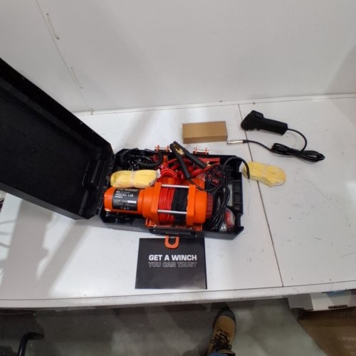 UGCEL ELECTRIC PORTABLE UTILITY SINGLE LINE PULL WINCH WITH STEEL MOUNTING PLATE, INTEGRATED HAWSE FAIRLEAD AND SYNTHETIC ROPE AND REMOTE - 12V DC - 4500LB/2041KG - BLACK/ORANGE (MODEL: TK4500) image 2