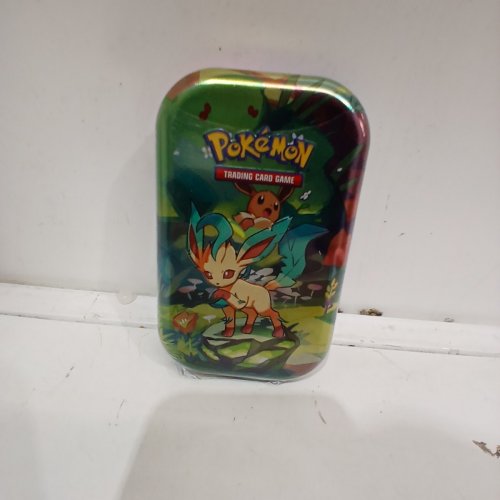 POKÉMON TRADING CARD GAME COLLECTIBLE PRISMATIC EVOLUTIONS MINI TIN , CONTAINS 2 PACKS image 2