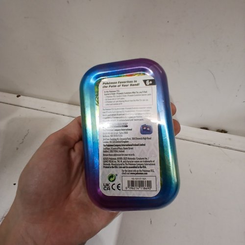 POKÉMON TRADING CARD GAME COLLECTIBLE PRISMATIC EVOLUTIONS MINI TIN , CONTAINS 2 PACKS image 3