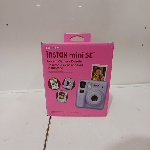 FUJIFILM INSTAX MINI SE INSTANT CAMERA BUNDLE WITH MAGNETIC FRAME, MINI ALBUM, AND 10 EXPOSURE MINI FILM PACK - LAVENDER image 4