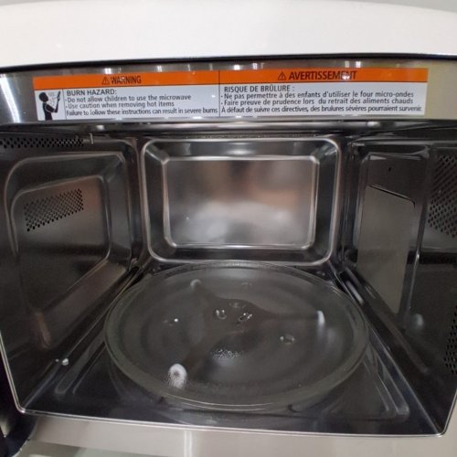 BLACK+DECKER 5-IN-1 MICROWAVE OVEN WITH AIR FRY, BAKE, ROAST AND CONVECTION COOKING - 0.9CU.FT - BLACK/SILVER - (MODEL: ES9P032NA-CA) image 7