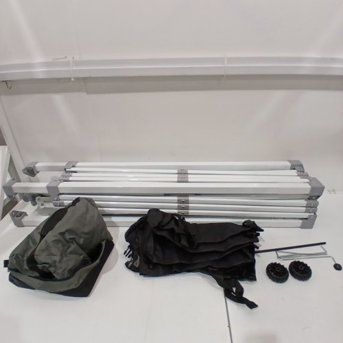 AMAZON BASICS OUTDOOR WATER-RESISTANT POP-UP CANOPY WITH STAKES / WEIGHT BAGS / ROPES & WHEELED CARRY BAG - 10FT X 10FT - WHITE image 3