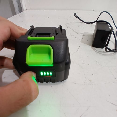 2PC LITHIUM-ION BATTERY AND CHARGER - 21 V 3.0 AH - BLACK / GREEN image 2