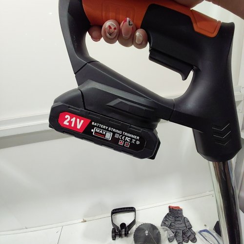 UNBRANDED LITHIUM ELECTRIC WEED WACKER WITH ACCESSORIES - 24V - ORANGE/BLACK image 2
