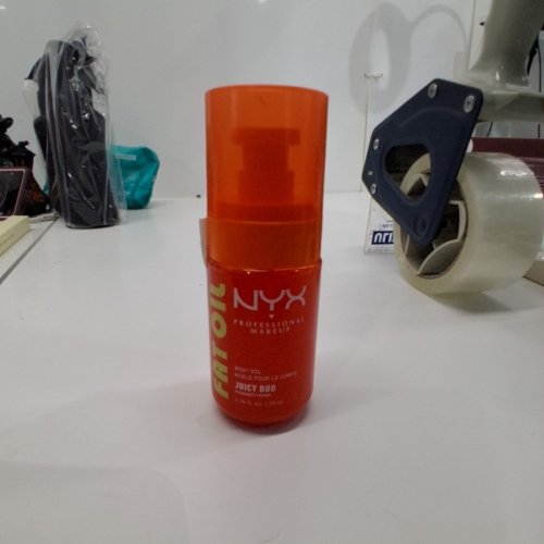 NYX FAT OIL GLITTER BODY OIL - 2.36 FL OZ / 70 ML - ORANGE (STYLE: JUICY BOO) image 4