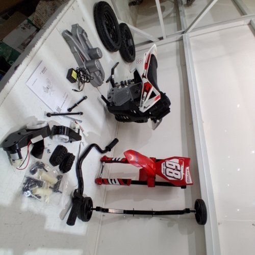 GARVEE P SERIES: 12V KIDS ELECTRIC DIRT BIKE WITH TRAINING WHEELS - 25W DOUBLE MOTOR - REALISTIC THROTTLE AND SPRING SUSPENSION - 66LBS MAX - RED/WHITE (MODEL: 7P5ZP) image 3
