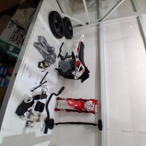 GARVEE P SERIES: 12V KIDS ELECTRIC DIRT BIKE WITH TRAINING WHEELS - 25W DOUBLE MOTOR - REALISTIC THROTTLE AND SPRING SUSPENSION - 66LBS MAX - RED/WHITE (MODEL: 7P5ZP) image 5
