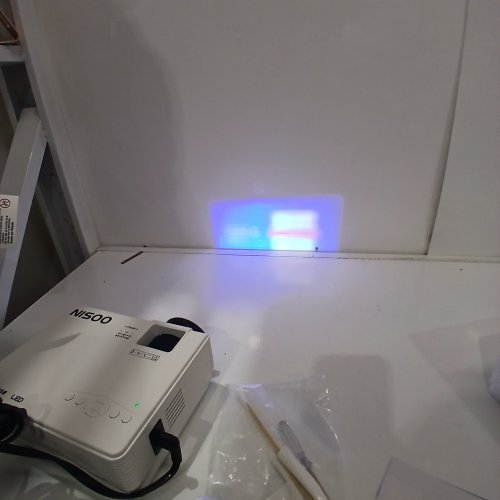 NISOO PORTABLE MINI PROJECTOR - WIFI, 8500L, SUPPORTS 1080P, 100" PROJECTOR SCREEN INCLUDED - WHITE (MODEL: M10) image 2