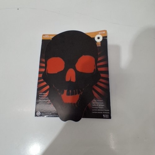 RADIANT SHADOWS LIGHT-UP SKULL DECORATION - BLACK AND RED (ITEM: 554475) image 2